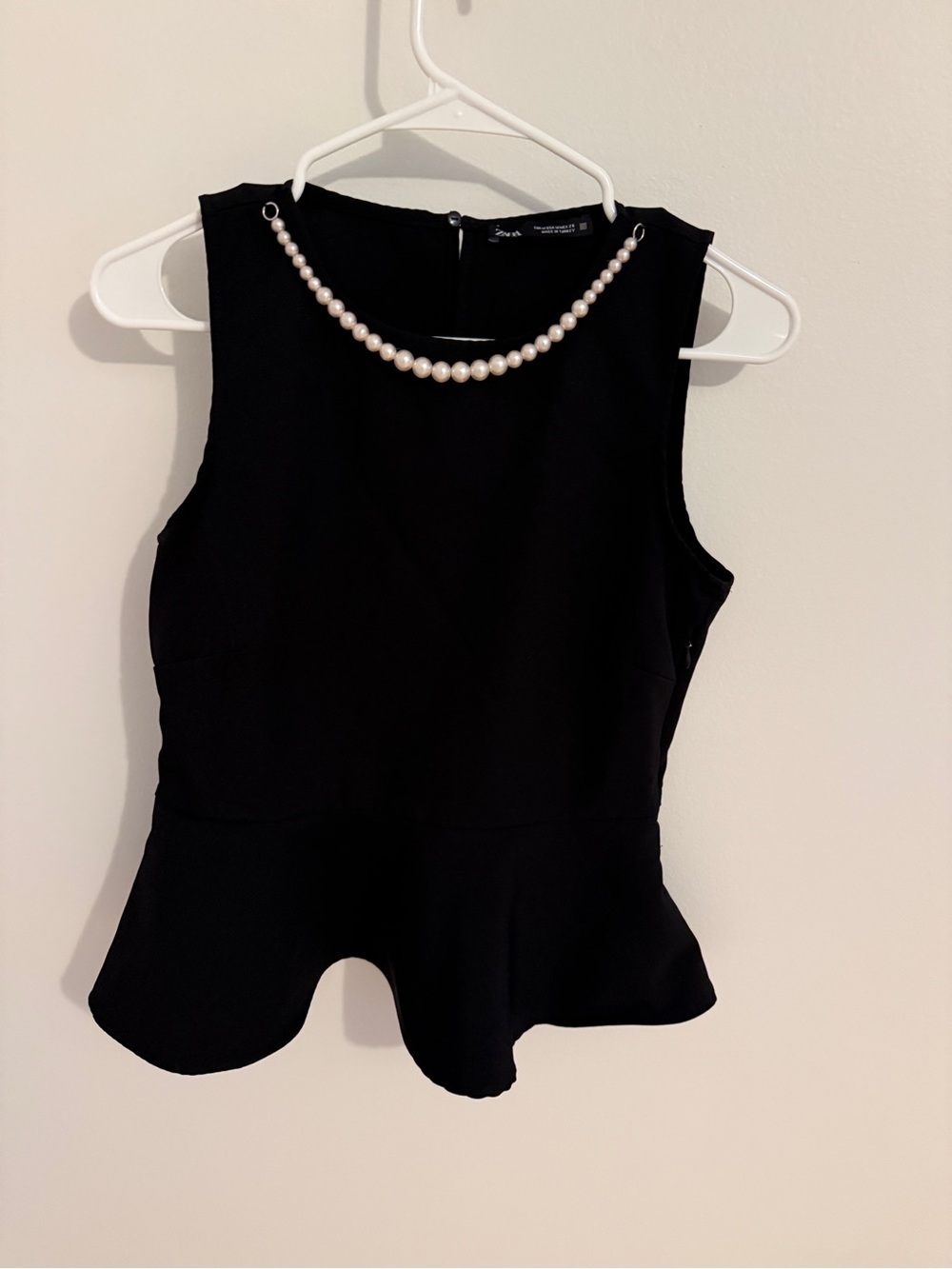 Zara Black Sleeveless Peplum Top with Pearl Neckline